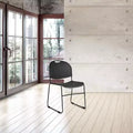 Chaise empilable ultra-compacte multi-usage noire - Piètement luge