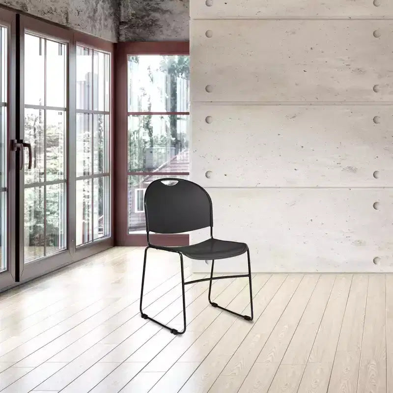Chaise empilable ultra-compacte multi-usage noire - Piètement luge
