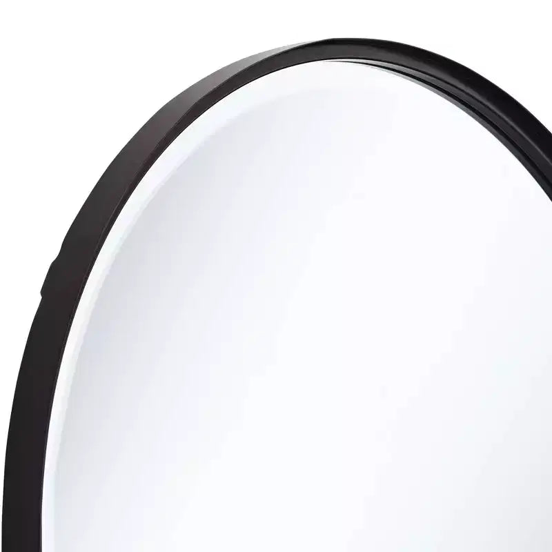 Miroir mural décoratif à dessus arqué, biseauté, cadre en métal noir mat et moderne